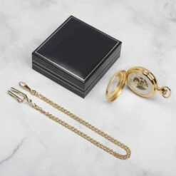 Numerals Skeleton Pocket Watch – Gold -Fashion Accessories Mount Royal Gold Pocketwatch Flatlay scaled 1